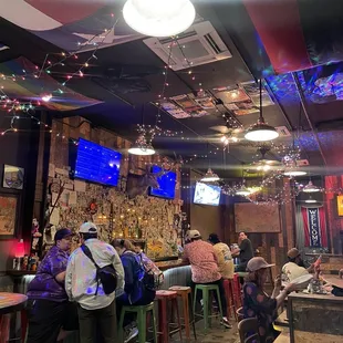 people sitting at the bar