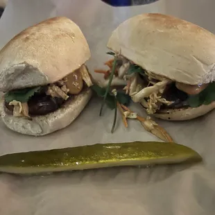 Pork belly bahn mi sandwich and yummy pickle spear