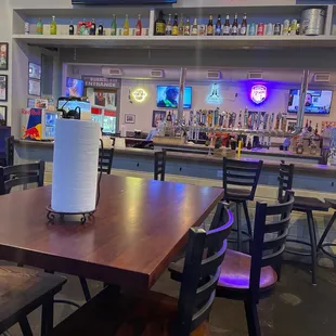 a table and chairs in a restaurant