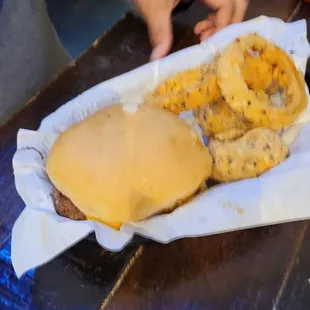 Chili cheeseburger with onion rings