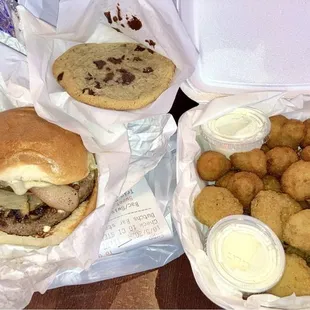 Bacon swiss mushroom burger, sweet potato fries. Trio platter-Onion rings, fried mushrooms, fried pickles. Chocolate chip cookie