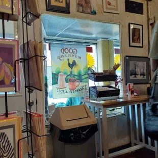 a woman walking through the shop