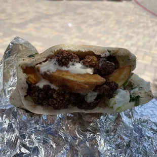 a close up of a pita sandwich