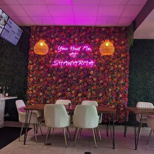 Table in front of the flower backdrop