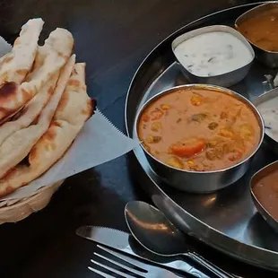 A large serving of the main dish, plus small amounts of many other items - a perfect table service version of my buffet preferences.