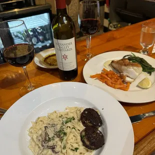 Delicious! Fettucini With Mushrooms and blackened scallops and Sea Bass Entree