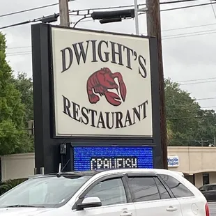 a car parked in front of a restaurant