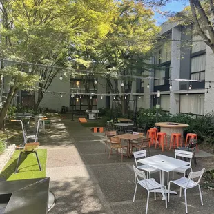 Beautiful outdoor courtyard with lots of seating &amp; games