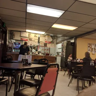 Bare bones dining room, with a homey feel.