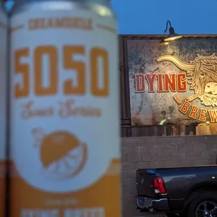 a truck parked in front of a building