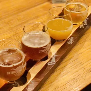 From left: Dad's Beer - cream ale; Pumpkin Roll - pumpkin ale; 50/50 Orange Creamsicle - smoothie sour; Space Cowboy - triple new england