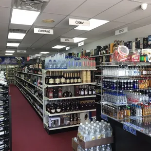 a wide aisle of liquor