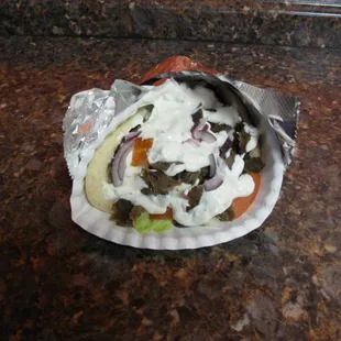 a sandwich wrapped in foil