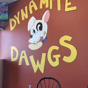 a sign for dynamite dawgs
