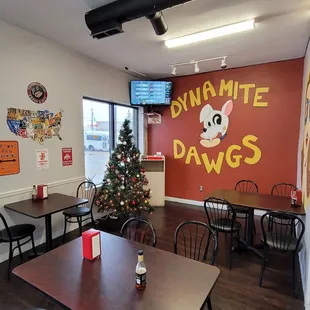 a dining area with tables and chairs