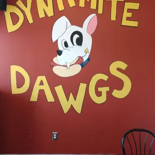 a sign for dynamite dawgs