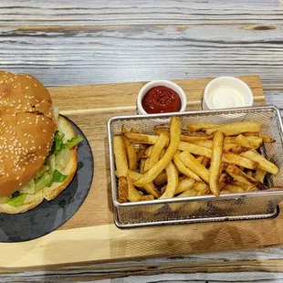 a burger and fries on a tray