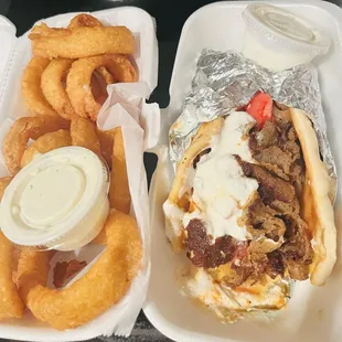 Onion rings/ranch, gyro with a bite missing