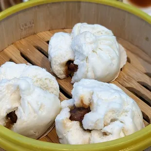 a basket of steamed food with ice cream