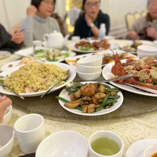 a group of people sitting around a table