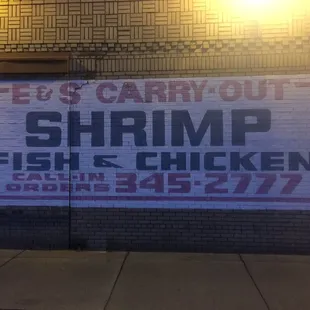 a sign on the side of a building