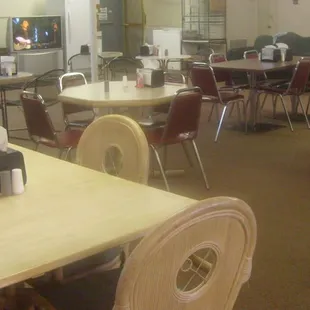 Relax in the dining area with a big TV and your favorite sandwich.