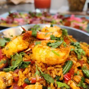 a plate of shrimp and rice