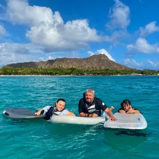 My 2 kids and father in his 70s all got up and foiling in our first lesson with Danny, Ben and Jake from EFoil Waikiki