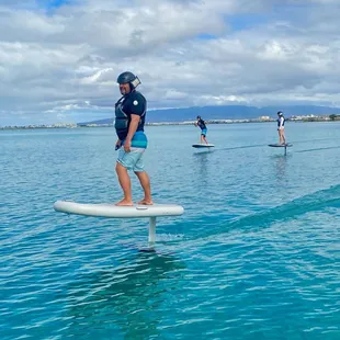 My 2 kids and father in his 70s all got up and foiling in our first lesson with Danny, Ben and Jake from EFoil Waikiki