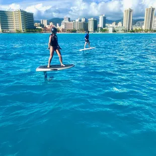 My 2 kids and father in his 70s all got up and foiling in our first lesson with Danny, Ben and Jake from EFoil Waikiki