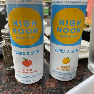  two cans of high noon vodka and soda