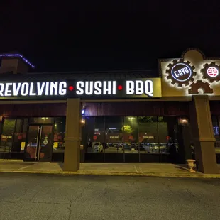 Outside. Storefront at night. Located inside International Plaza. Same strip as Sushi Hayakawa, Red and Green Brazilian Steakhouse.