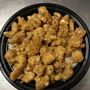a bowl of chicken and rice