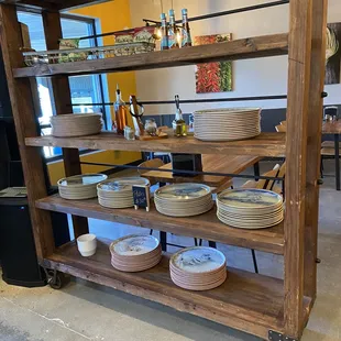 shelves with plates and bowls on them