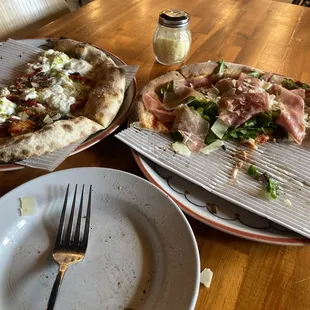 Pesto pizza and prosciutto pizza