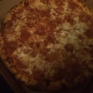 12 cut large pizza! About $12 . Not the best photo quality so my apologies!