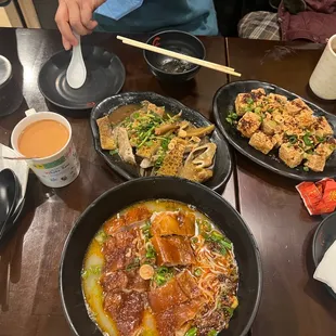 This was the spicy duck noodle, the fried tofu, marinated intestines, and the HK style milk tea.