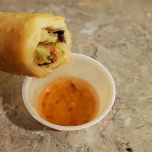 Yummy spring rolls and dipping sauce