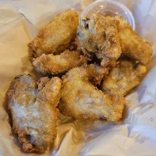 Six crispy wings, $7