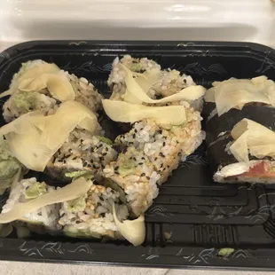 2 Alaskan rolls and house roll with 2 pieces eaten. This container is small, like 4" x 5"... this cost me $36+ with tax before tip...