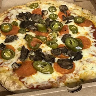 Small pepperoni pizza with mushrooms and jalapeños - Very Good - I could only eat half - Had to leave the rest :-(