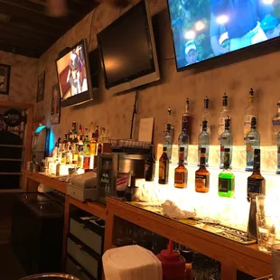 The wall behind the bar.