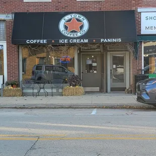 a coffee shop on a street corner