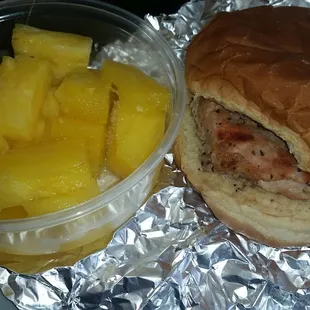Pork chop sandwich and pineapple