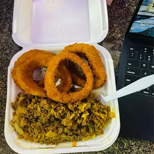 Steak and rice with onion rings comes with a drink