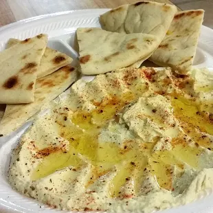 Side order of AH-MAZING Hummus and lovely hot, soft pita pieces!