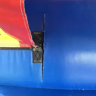 EZ said this tear wasn't on a seam so I had to pay $75 for this