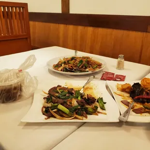 three plates of food on a table