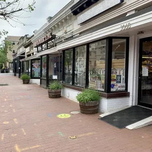 the storefronts and the sidewalk