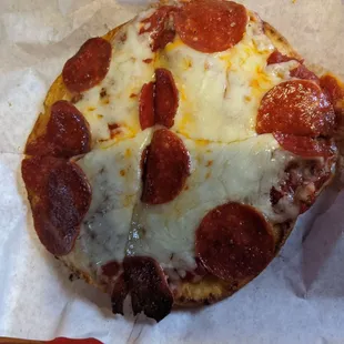 Kids pizza. This picture does not do it justice. It always gets finish before we leave.